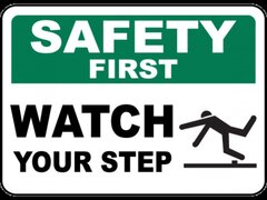 Safety First Watch Your Step Sign